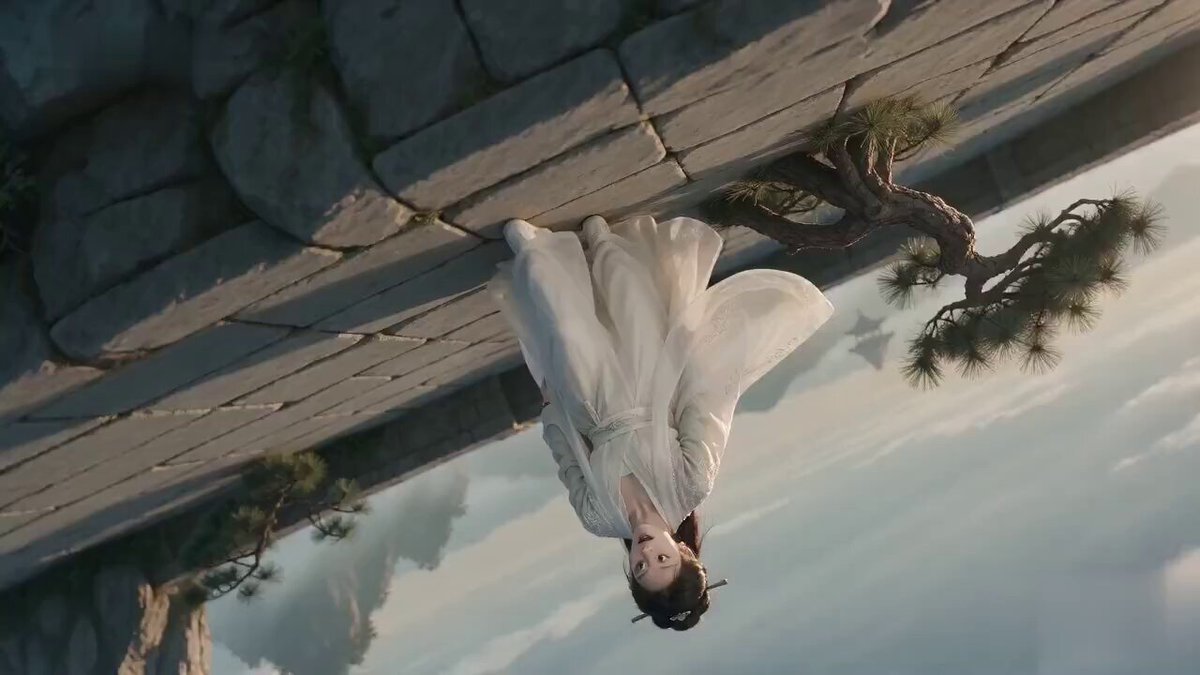 Xianxia Cliff Walk on a Rotated Frame — AI video prompt sample